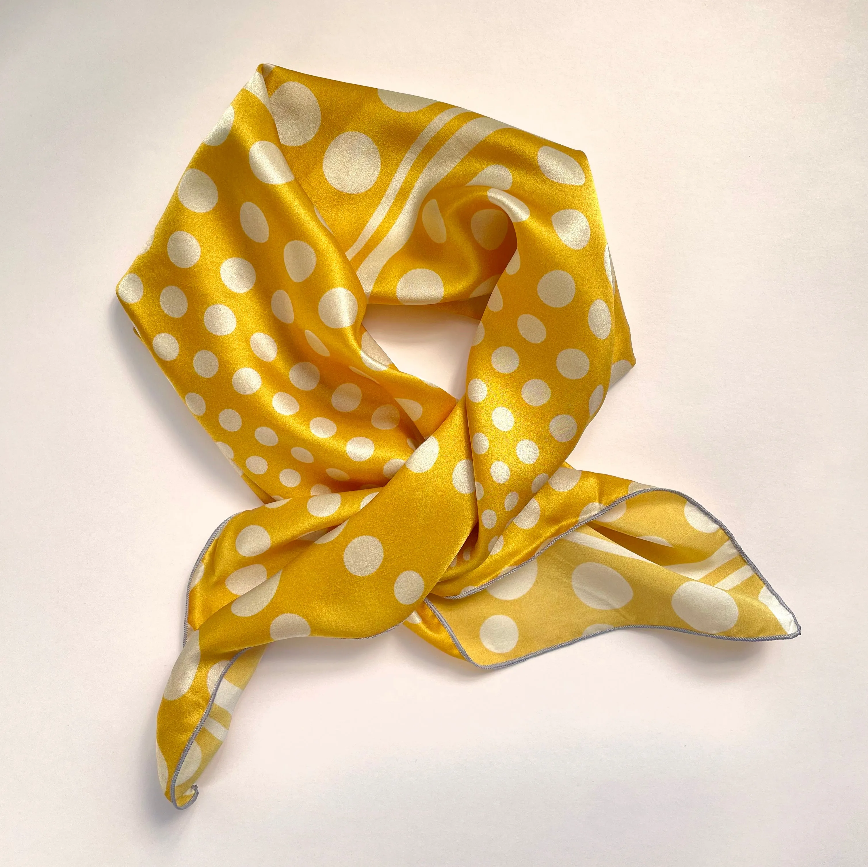 Vitamin D -  yellow square silk scarf with geometric polka dot pattern